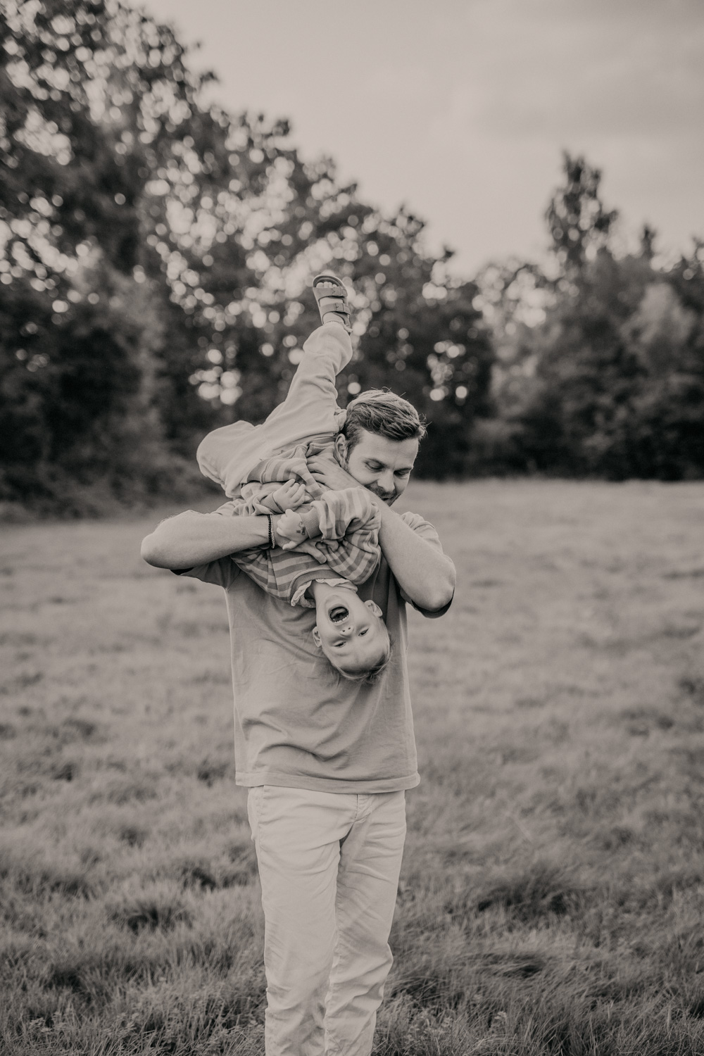 a man holding a baby