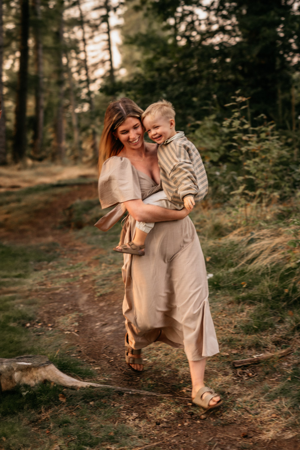 a woman holding a baby