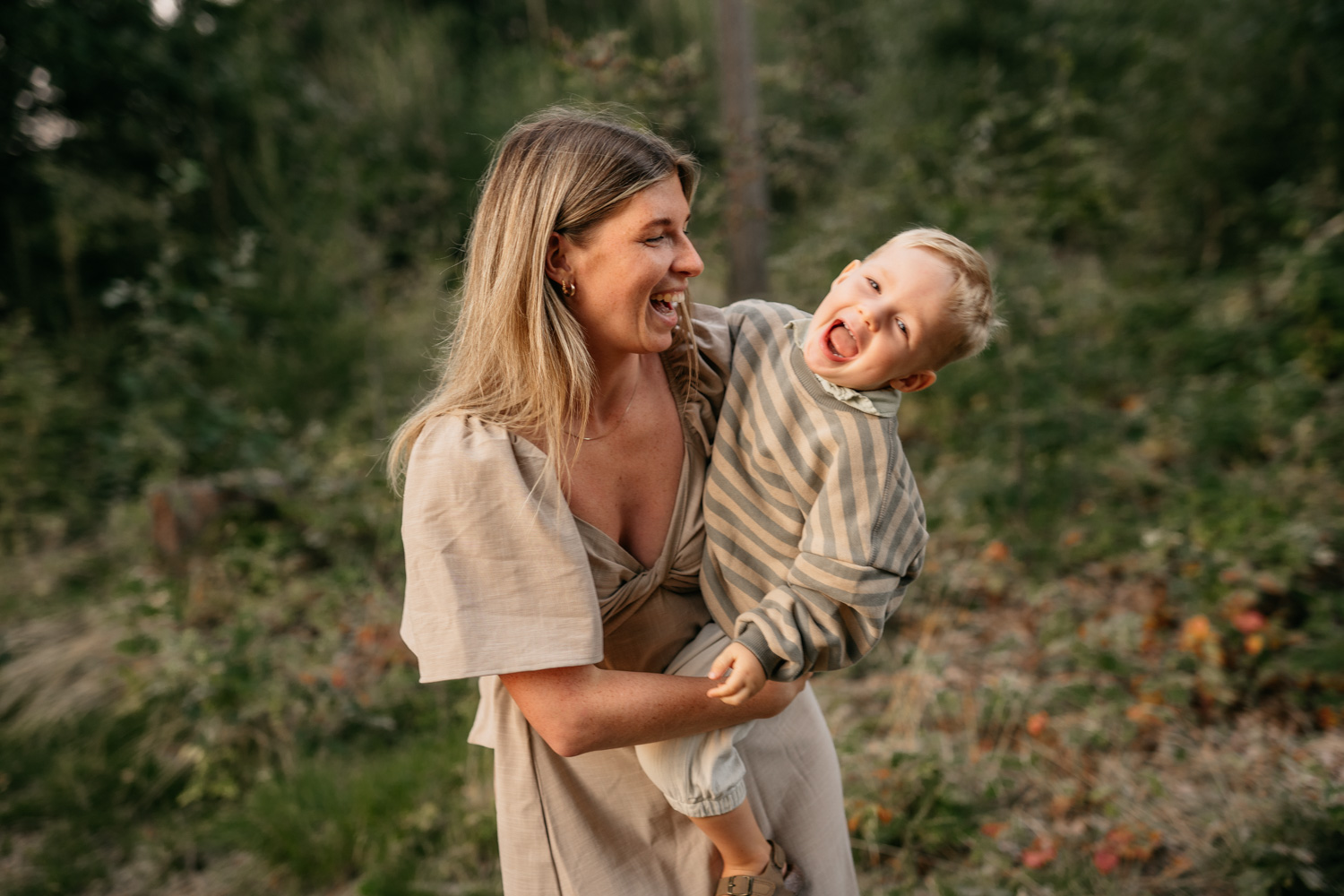 a woman holding a baby